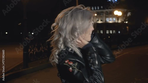 Woman disarranging her hair