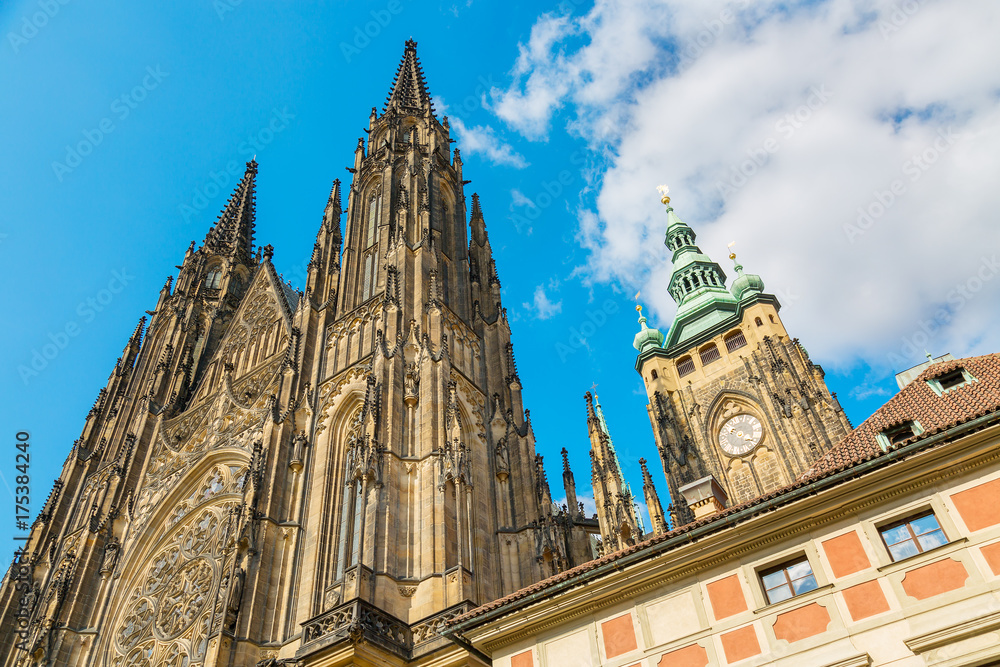 Closeup view on gothic cathedral of St. Vitus with blue sky in Prague Castle, Prague, Czech Republic