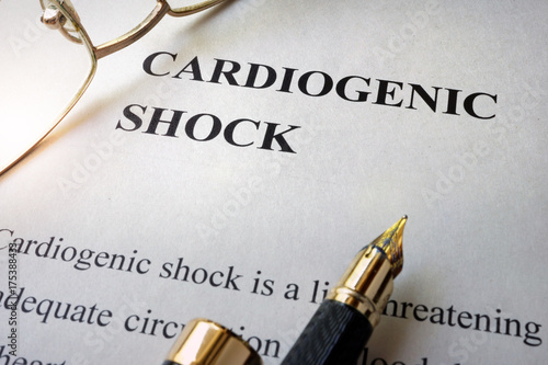 Paper with word cardiogenic shock and glasses. photo