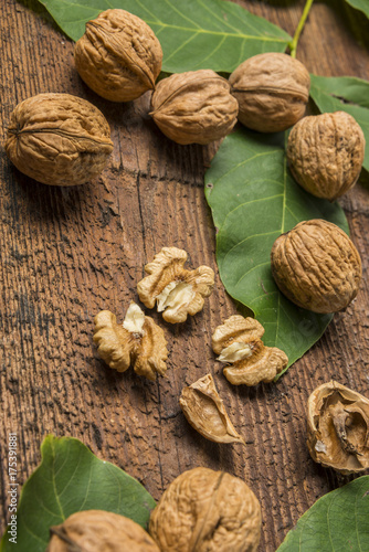 fresh walnuts on an old wooden table