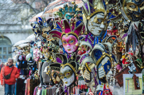 Traditional venetian mask in store on street, Venice Italy.