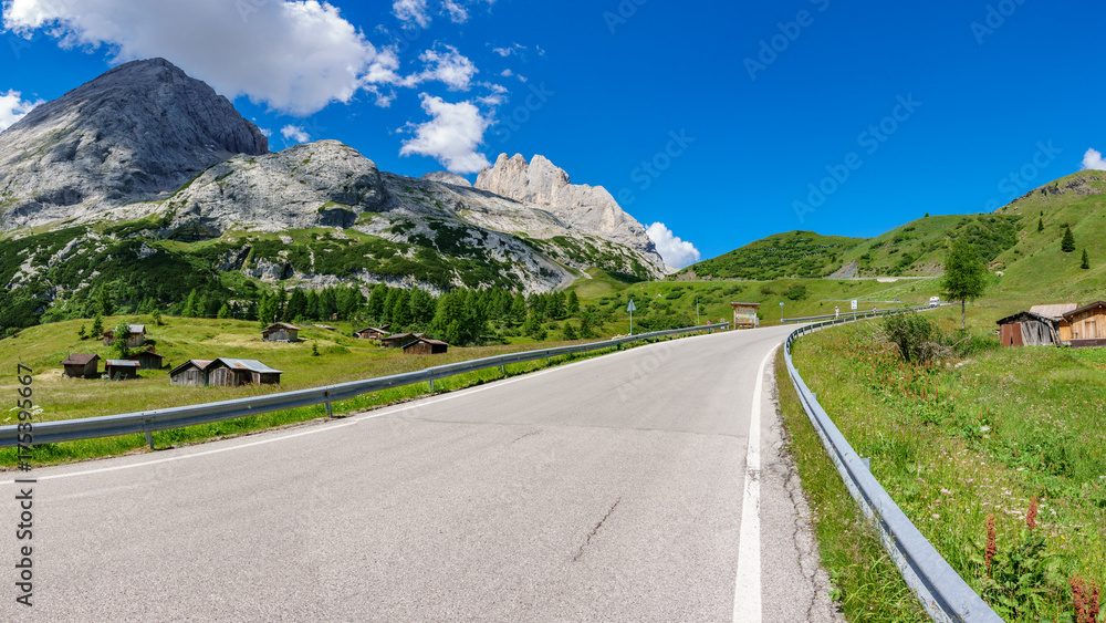 Naklejka premium Empty road to Marmolada mountain, Dolomiti Italy.