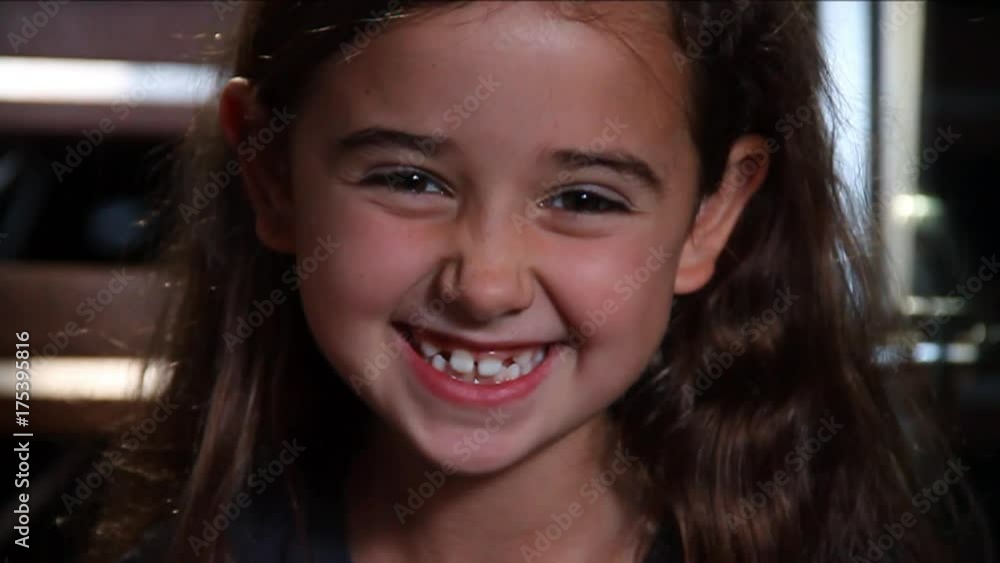 Little girl laughs, close up Little girl laughs, close up