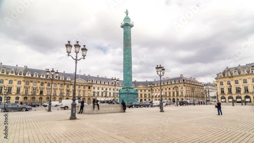 Vendome column with statue of Napoleon Bonaparte on the Place Vendome timelapse hyperlapse. Paris, France. photo