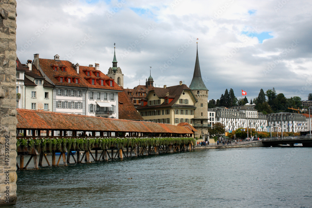 Famous Chapel bridge in Lucerne in a beautiful summer day, Switzerland Famous Chapel bridge in Lucerne in a beautiful summer day, Switzerland