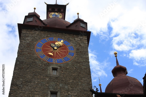 Top of Rathaus tower hall in Lucerne, Switzerland with the oldest city clock built by Hans Luter in 1535 photo