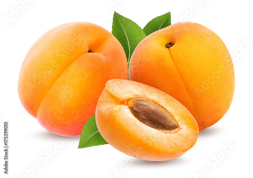 Fresh three apricots with leafs isolated on white background