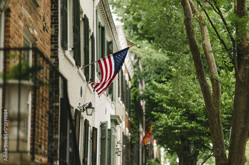 Neighborhoods In Old Town Alexandria Adorned With American Flags