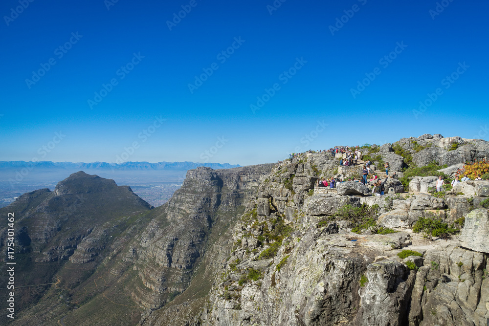 People viewing Devil's Peak and the Saddle from Table Mountain, Cape Town