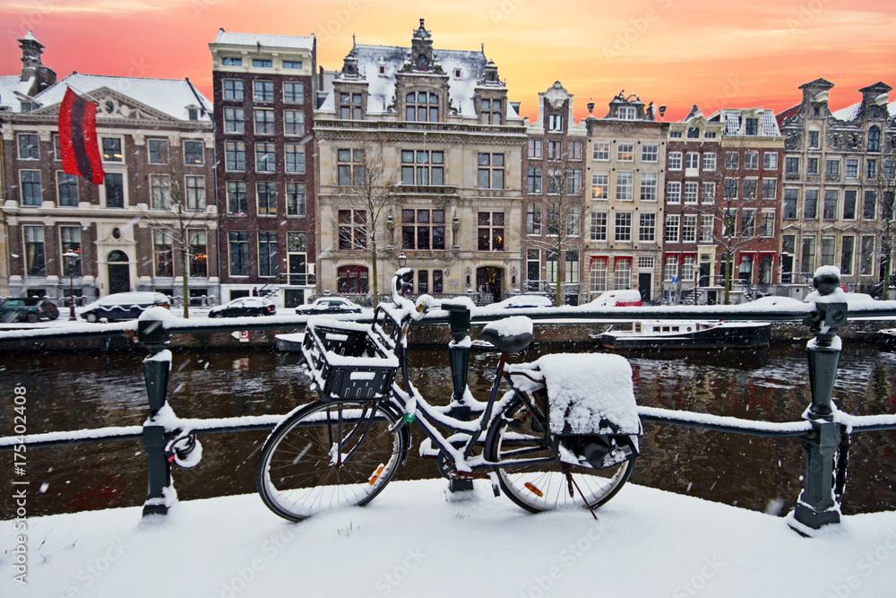 Amsterdam in winter in the Netherlands at sunset