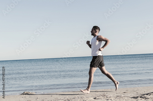 Healthy sports man running