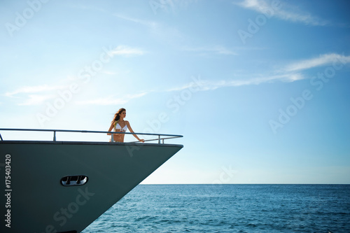 beautiful woman has a rest on the yacht