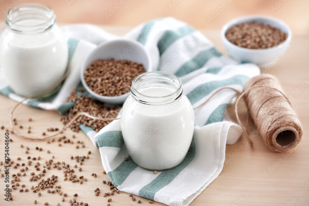 Beautiful composition with hemp milk on table Beautiful composition with hemp milk on table