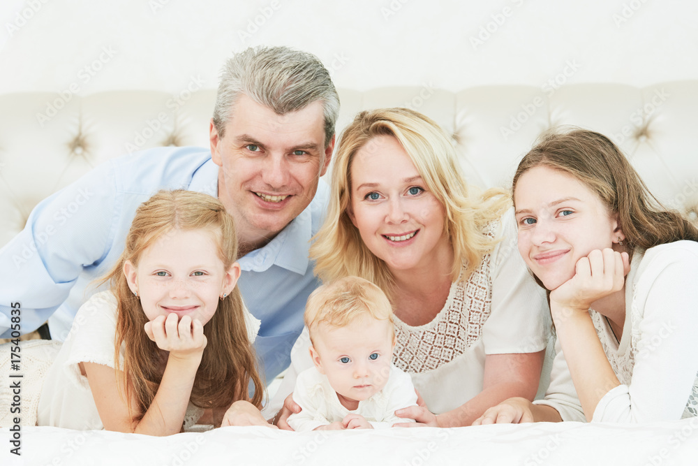 Parenting family. Mother and father playing with little newborn baby Parenting family. Mother and father playing with little newborn baby