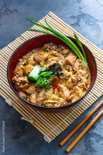 Oyakodon japanese chicken, egg on top of the rice bowl photo
