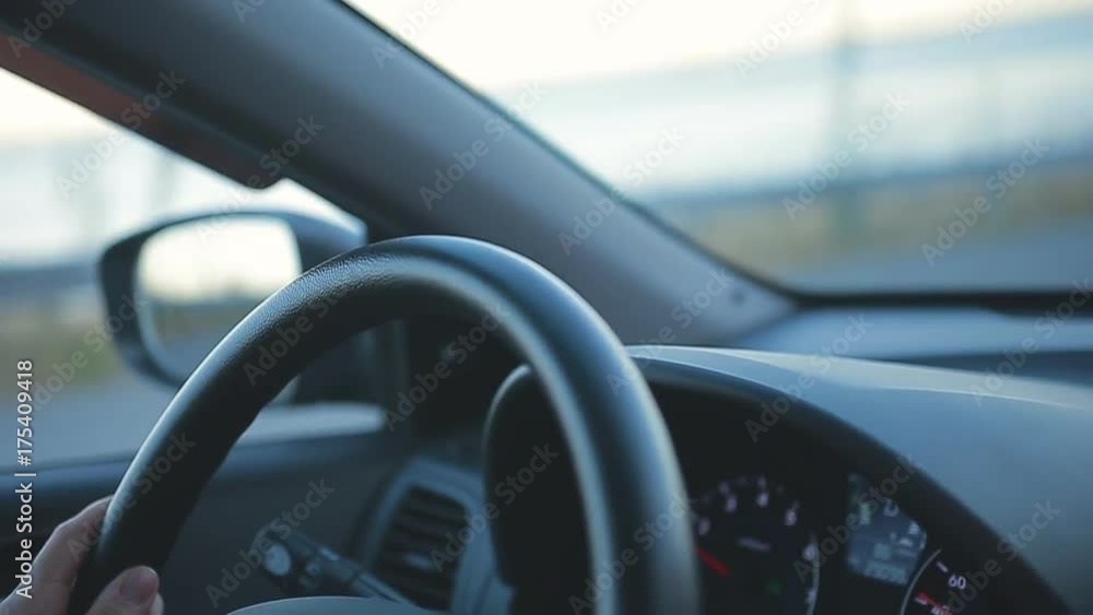 beautiful and sexy girl in red dress rides behind the wheel of a car beautiful and sexy girl in red dress rides behind the wheel of a car