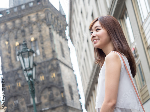 attractive asian woman traveling in europe