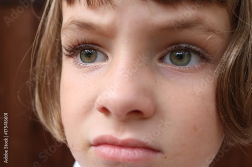 Close up portrait of a frustrated young girl