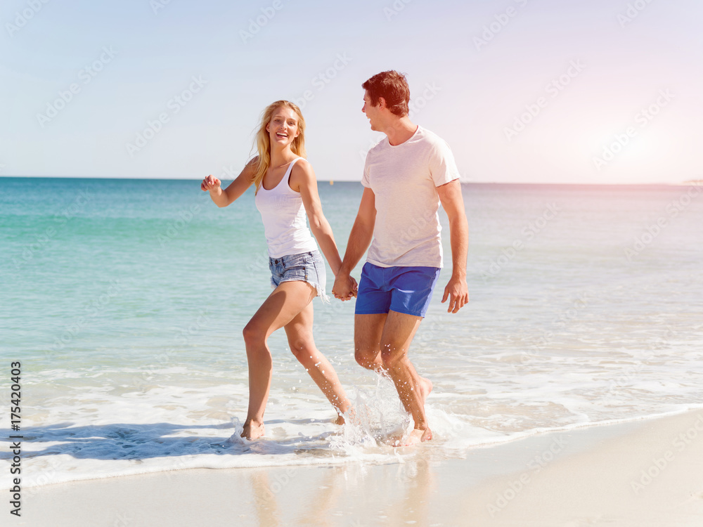 Romantic young couple on the beach