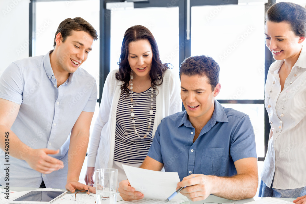 Group of happy young business people in a meeting Group of happy young business people in a meeting