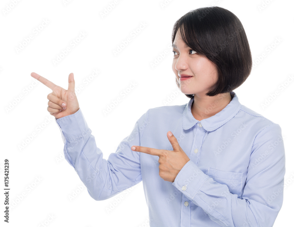 Beautiful asian business woman smiling and pointed the finger to left side portrait studio on white background Beautiful asian business woman smiling and pointed the finger to left side portrait studio on white background