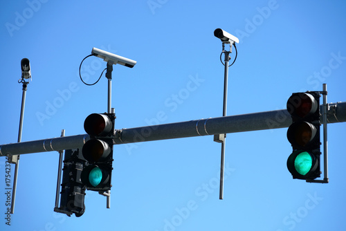 Traffic light and surveillance camera