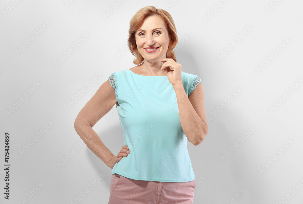 Beautiful mature woman on white background Beautiful mature woman on white background