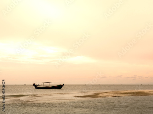 Coastal fishing boats are parked.