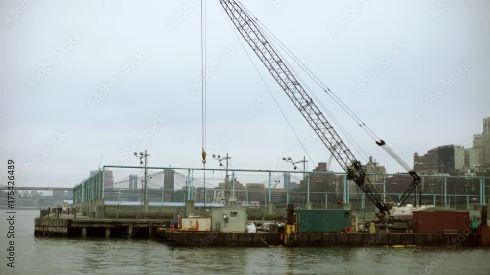 Shot of pier and crane near Hudson river Shot of pier and crane near Hudson river