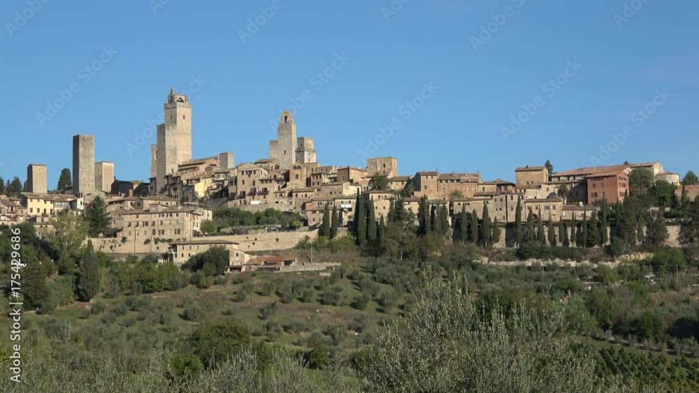 The view of the medieval town of San Gimignano, sunny september day. Italy The view of the medieval town of San Gimignano, sunny september day. Italy