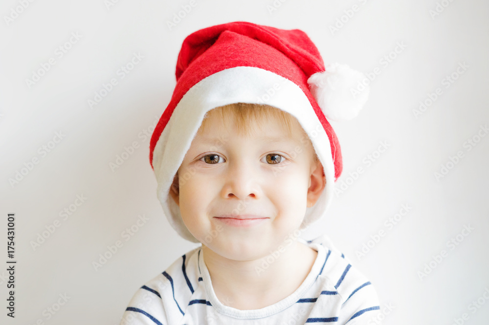 Portrait of a boy wearing a Santa Claus hat Portrait of a boy wearing a Santa Claus hat