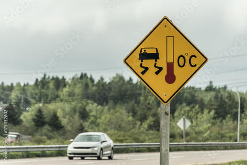 warning sign for slippery icy road trans canada photo