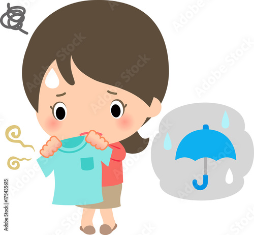 雨の日の洗濯物の悪臭に悩む女性