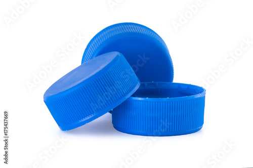 Three blue plastic bottle caps