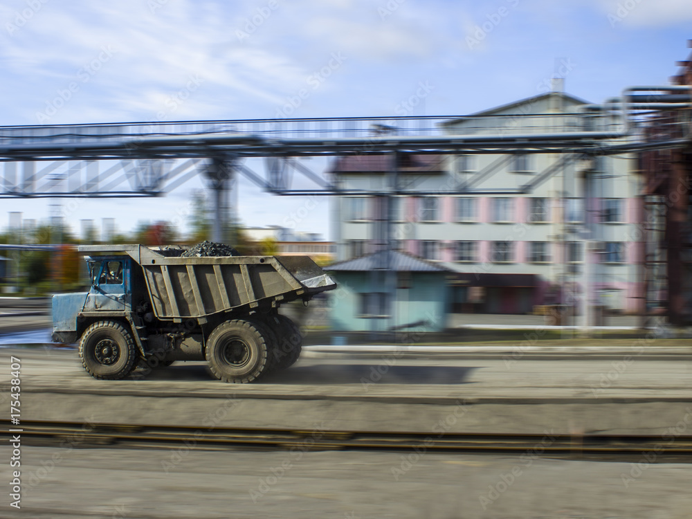 mining truck rides on factory