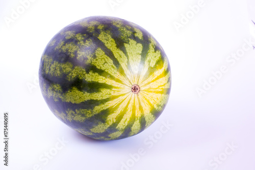 whole watermelon side view on white background