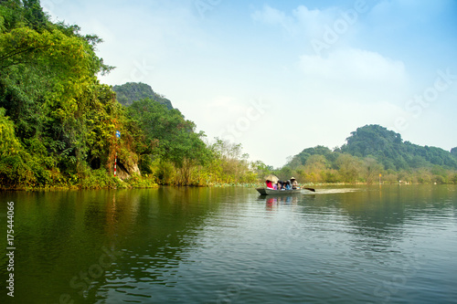 Traveling by boat on streams YEN in Hanoi, Vietnam. 