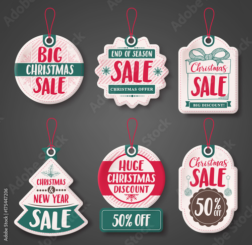 Christmas sale price tags vector set with different discount text and shapes of white paper cut label hanging for season promotion. Vector illustration.
