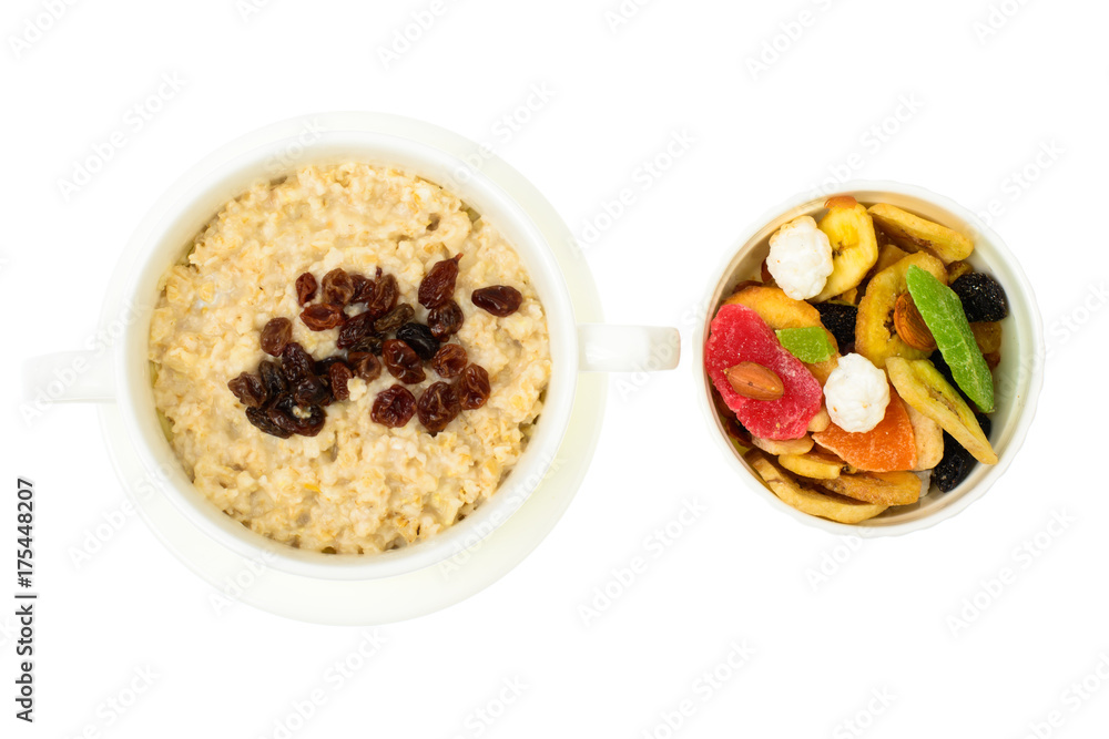 Health and Fitness food. Oatmeal porridge with berries and dried fruits Health and Fitness food. Oatmeal porridge with berries and dried fruits