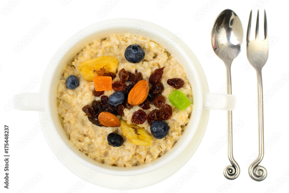 Health and Fitness food. Oatmeal porridge with berries and dried fruits Health and Fitness food. Oatmeal porridge with berries and dried fruits