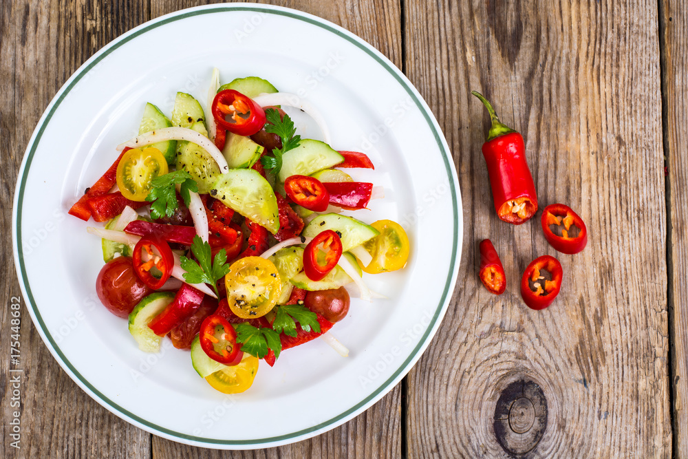 Spicy salad of fresh vegetables with chili Spicy salad of fresh vegetables with chili