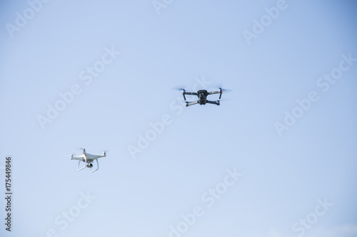 Fototapeta Naklejka Na Ścianę i Meble -  Two flying drones
