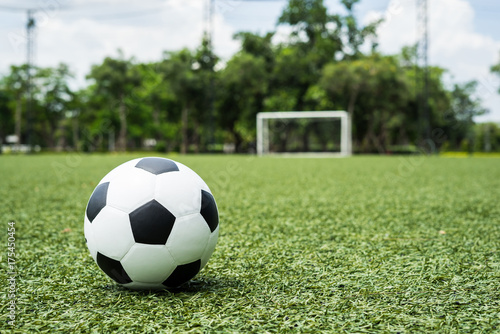 football field  ball on green grass , soccer field  background texture © suphaporn