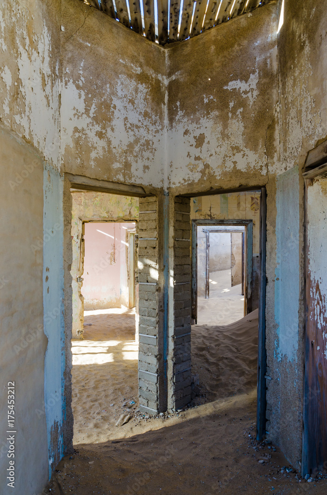 Ruins of once prosperous German mining town Kolmanskop in the Namib desert near Luderitz, Namibia, Southern Africa