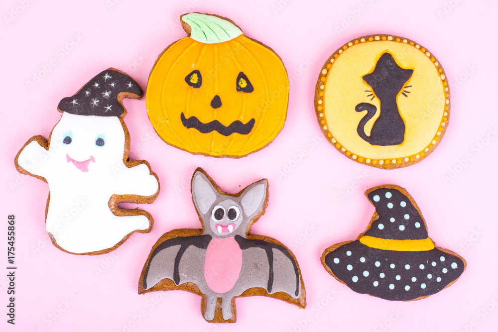 Halloween gingerbread on bright pastel color Halloween gingerbread on bright pastel color