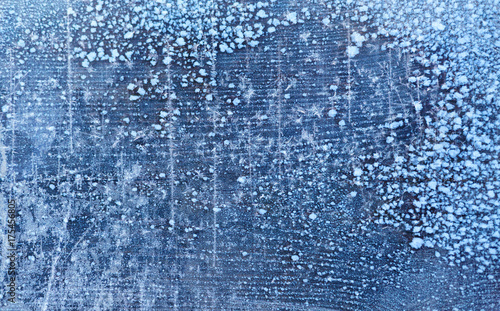 Blue frosty winter Background; snow and ice; wood texture