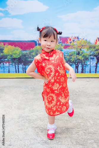 Little chinese girl in traditional chinese costume