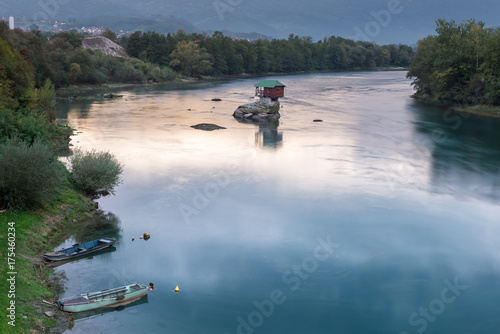 Lonely house on the river Drina in Bajina Basta, Serbia photo