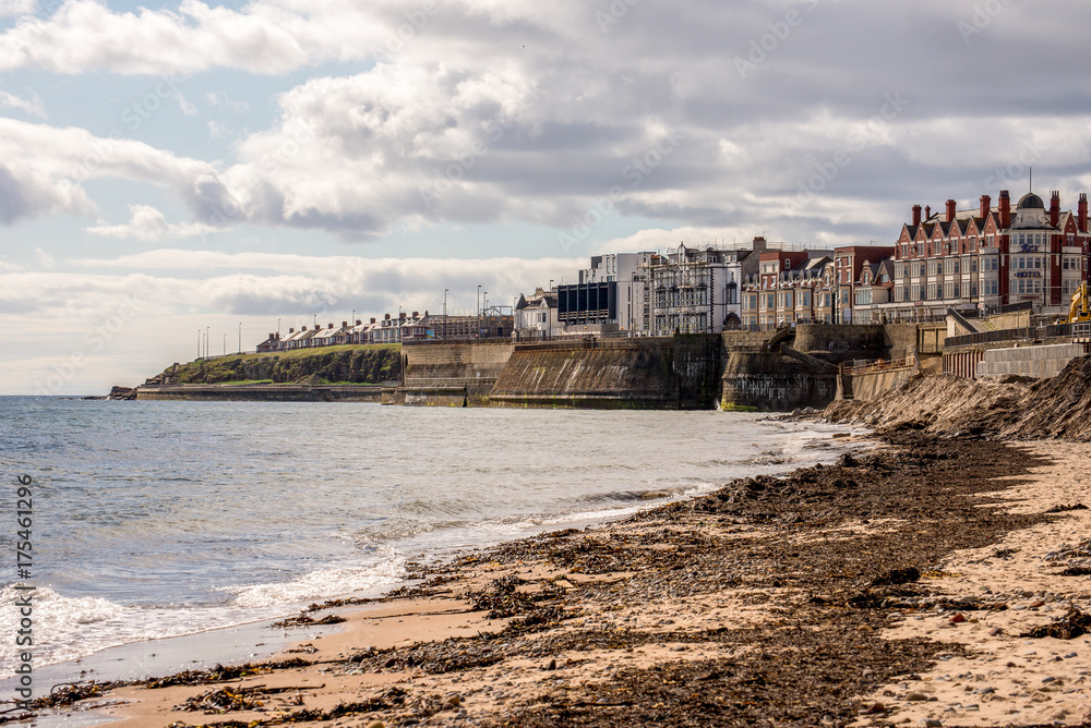 A view to Whitley Bay town and its coastline from the beach, England