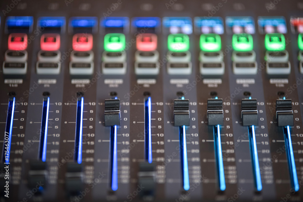 Slide the audio mixer in the control room. Slide the audio mixer in the control room.